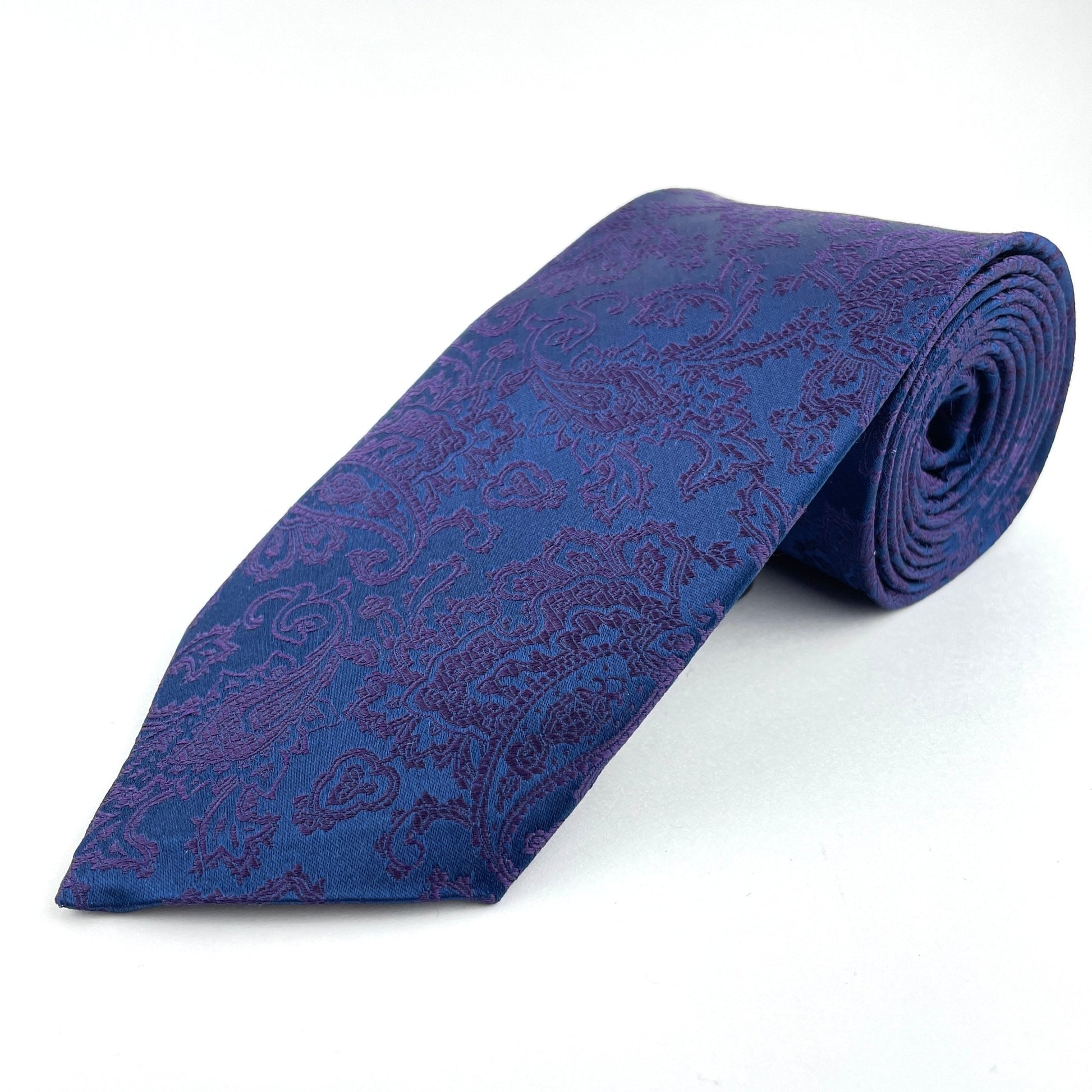 Navy blue tie with purple paisley pattern made in America