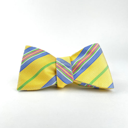 Yellow bow tie with blue and green stripes made in America